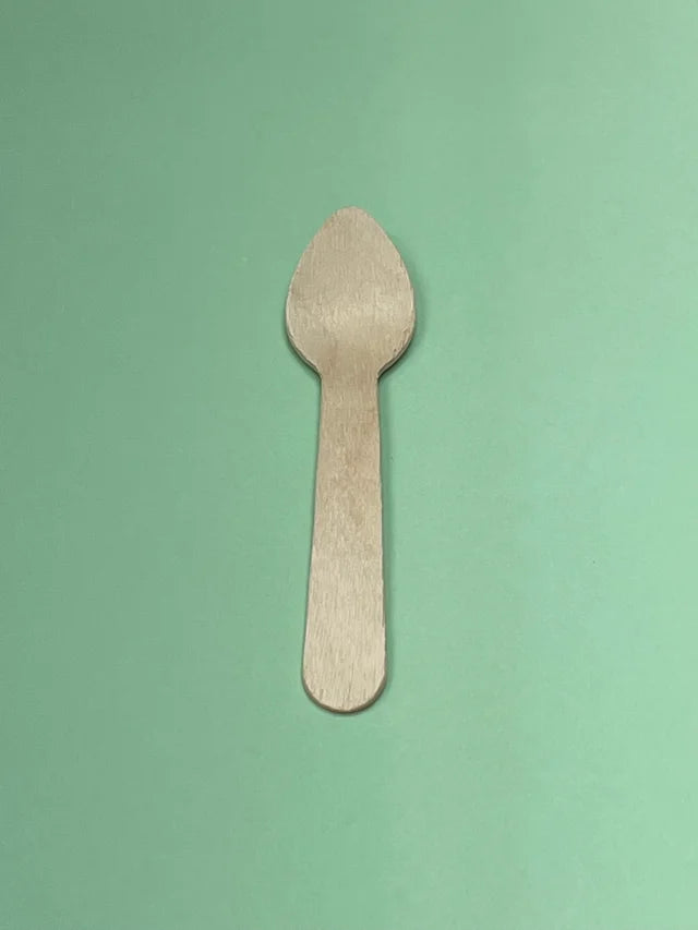 A picture of a single wood spoon